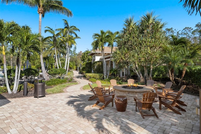 view of patio with a fire pit