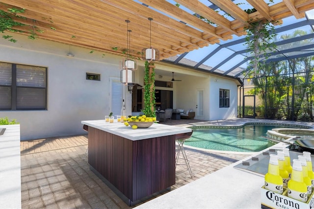 7024 Brier Creek Ct, Lakewood Ranch, FL 34202 - view of swimming pool featuring a patio area, glass enclosure, a ceiling fan, a pool with connected hot tub, and an outdoor hangout area