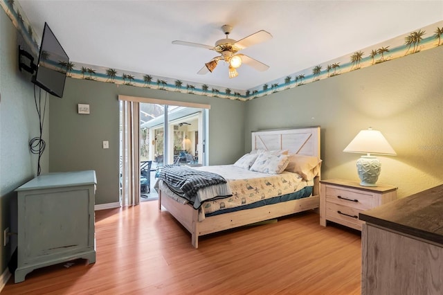 bedroom featuring ceiling fan, access to outside, and light wood finished floors