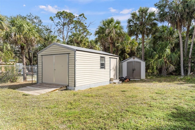 view of shed with fence