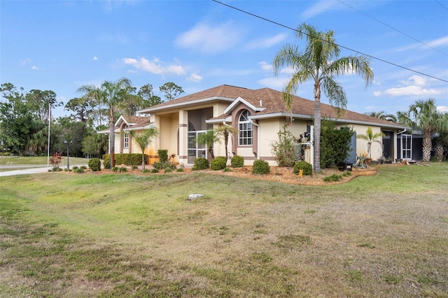 17368 Norseman Ave, Port Charlotte, FL 33948 - ranch-style home with stucco siding and a front lawn