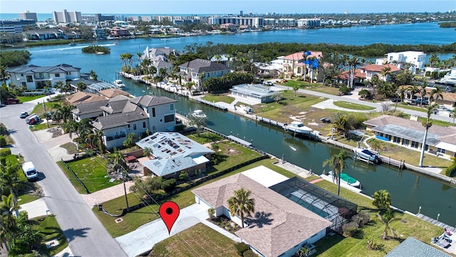 bird's eye view with a water view