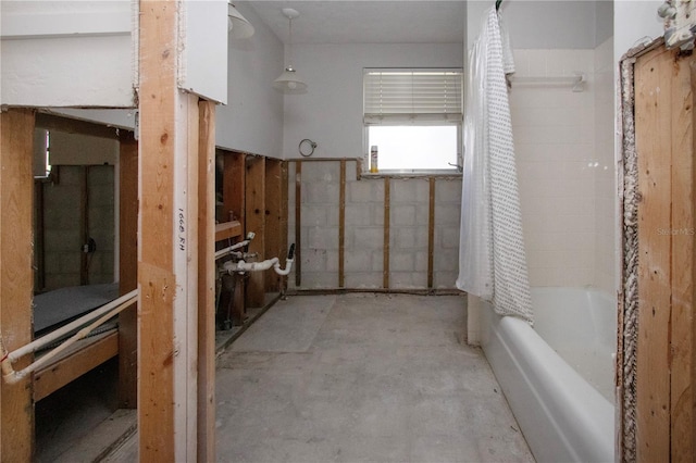 bathroom featuring shower / bath combination with curtain