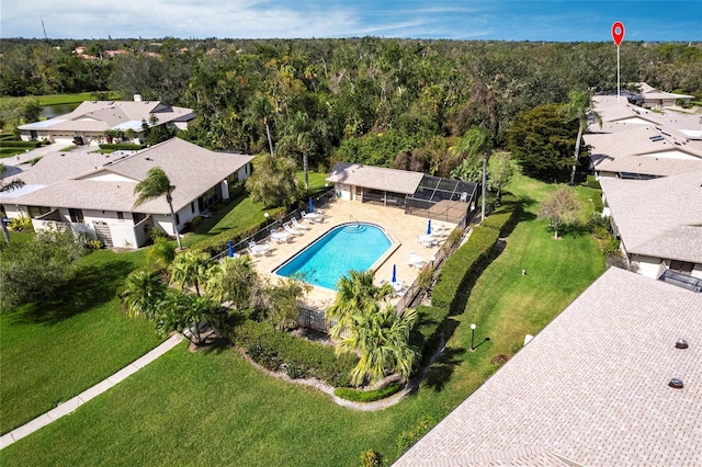 drone / aerial view with a view of trees