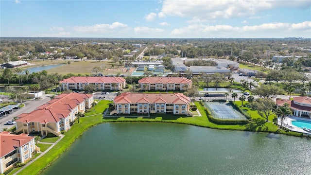 aerial view featuring a water view and a residential view