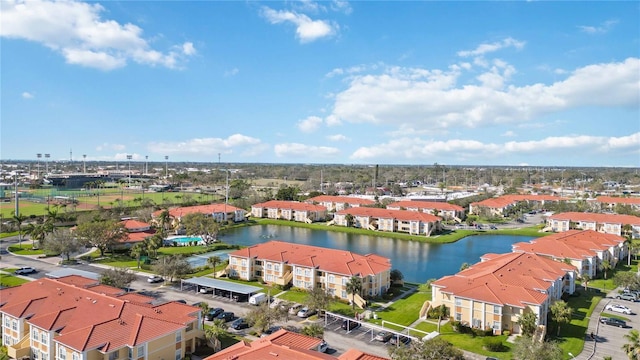 aerial view with a water view and a residential view