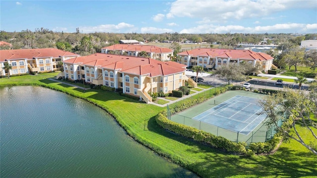 aerial view with a residential view and a water view