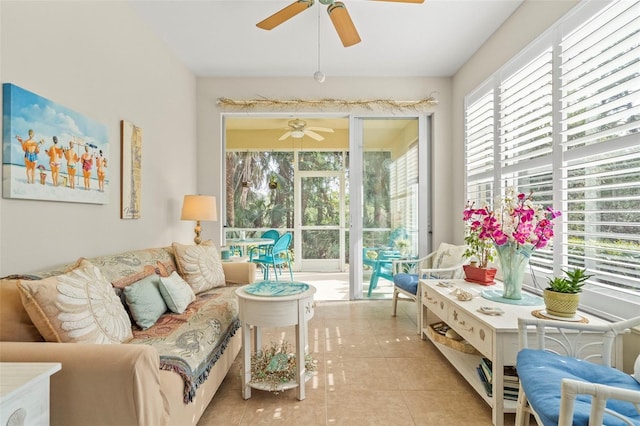 sunroom / solarium with ceiling fan