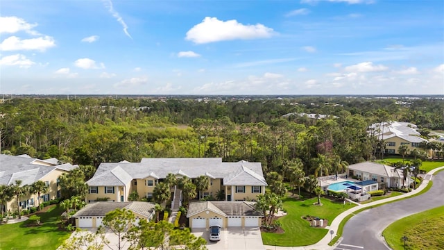 aerial view with a forest view and a residential view