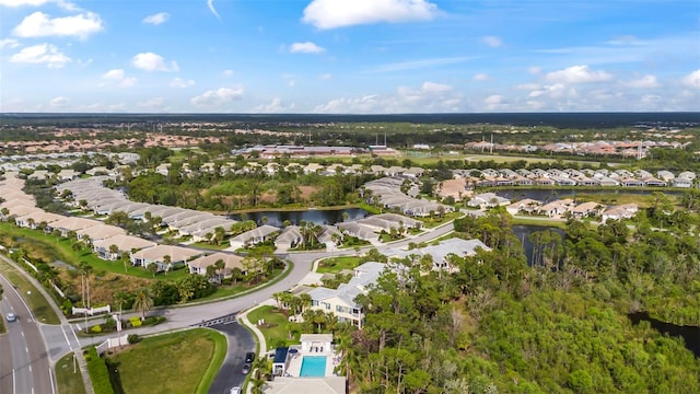 aerial view featuring a residential view and a water view