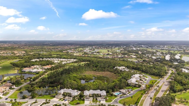 birds eye view of property with a residential view and a water view