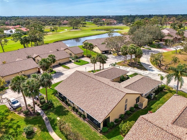 bird's eye view featuring a residential view, a water view, and view of golf course