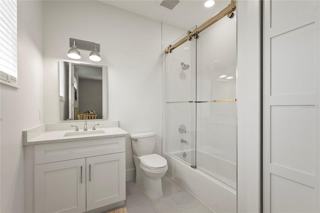 full bath featuring tile patterned floors, visible vents, toilet, enclosed tub / shower combo, and vanity