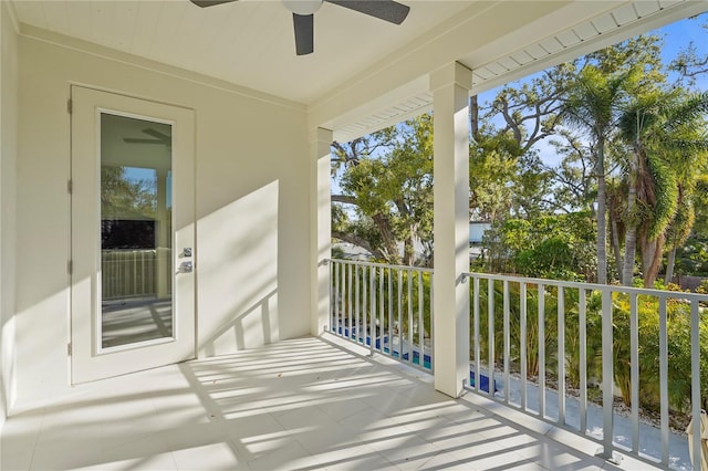 balcony featuring a ceiling fan