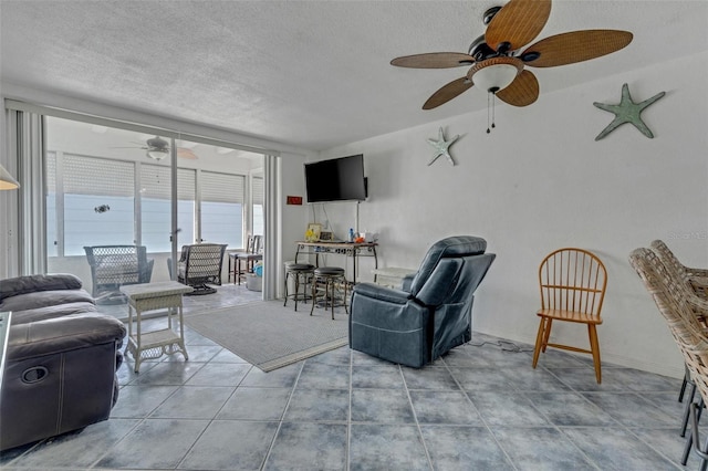 tiled living room with a textured ceiling