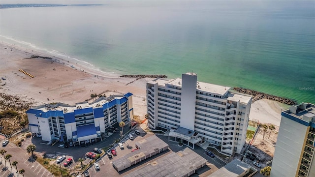 bird's eye view with a beach view and a water view