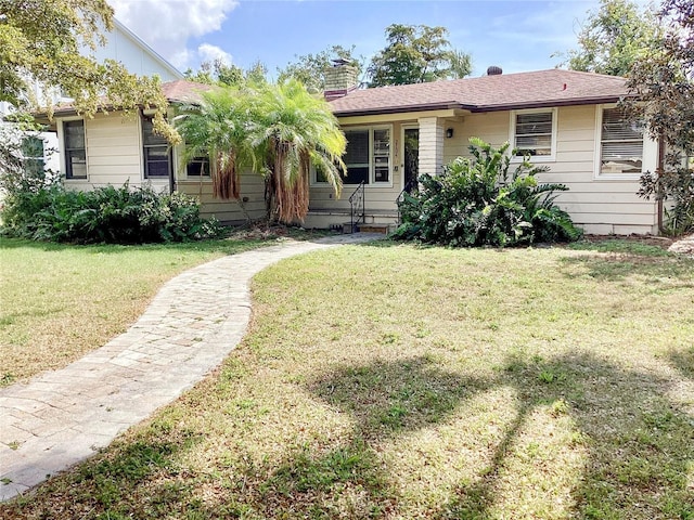 view of front of home featuring a front lawn