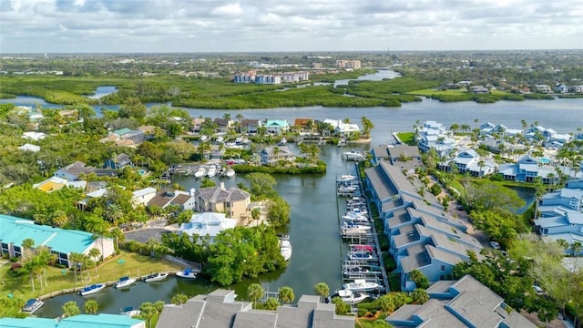 bird's eye view with a water view and a residential view