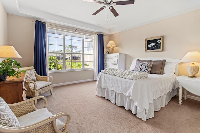 bedroom featuring carpet, a ceiling fan, and baseboards