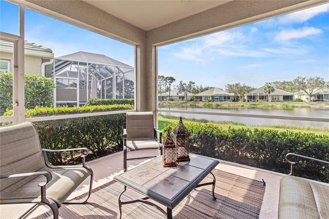 exterior space featuring a water view and a residential view