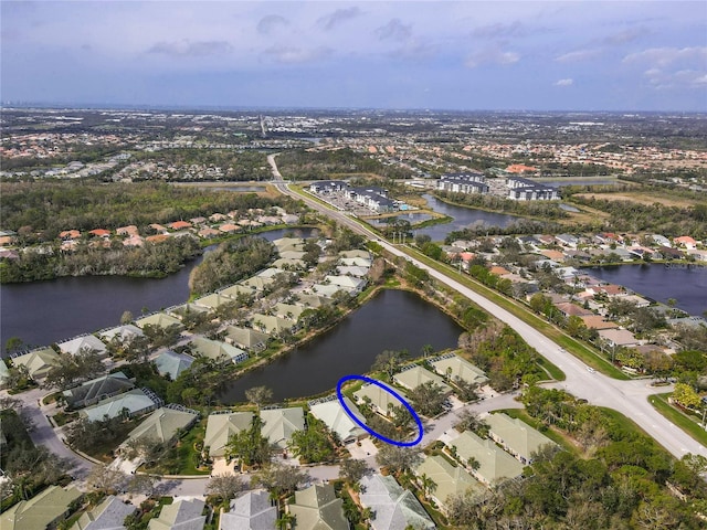 aerial view with a residential view and a water view