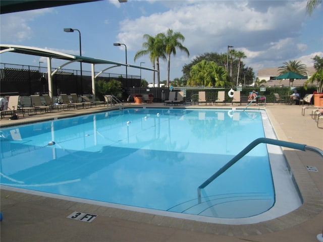 community pool with fence