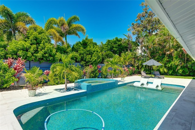 526 Bird Key Dr, Sarasota, FL 34236 - view of pool with a patio area and a pool with connected hot tub