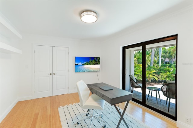 526 Bird Key Dr, Sarasota, FL 34236 - office with light wood-type flooring, ornamental molding, and baseboards