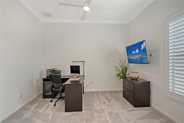 office featuring baseboards, visible vents, ornamental molding, and light colored carpet