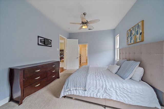 bedroom featuring ceiling fan and light colored carpet