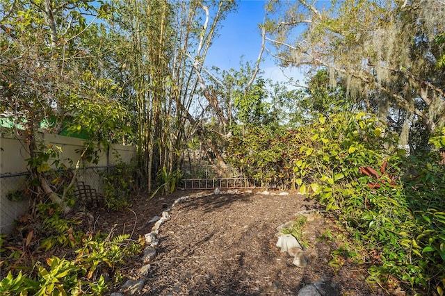 view of yard with fence