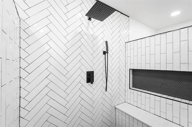 interior space featuring tiled shower