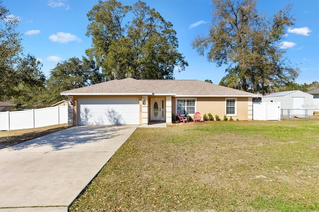 ranch-style house with a garage, a front yard, and fence