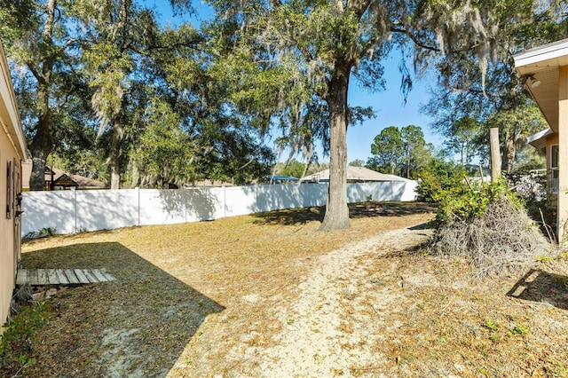 view of yard featuring a fenced backyard