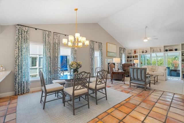 tiled dining room with ceiling fan with notable chandelier, baseboards, built in features, and vaulted ceiling