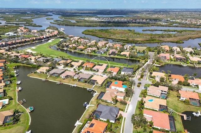 aerial view featuring a water view and a residential view