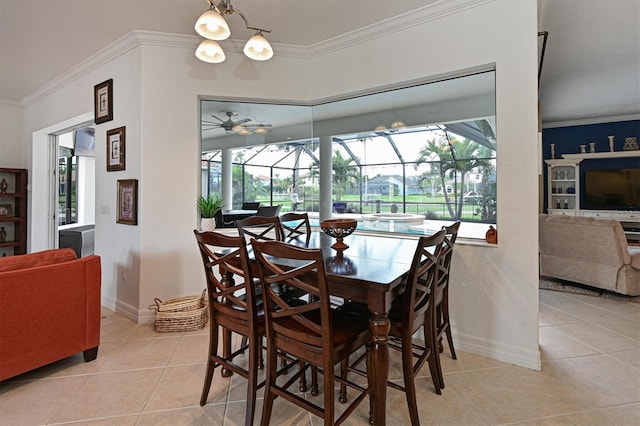 dining space with light tile patterned floors, ornamental molding, a sunroom, and baseboards