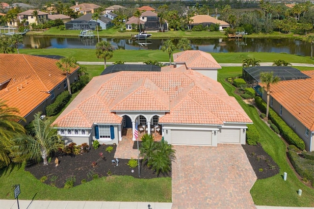 aerial view with a residential view and a water view