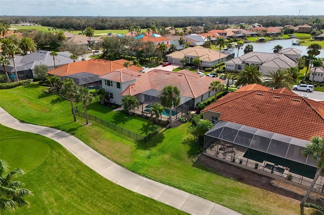 aerial view with a water view and a residential view