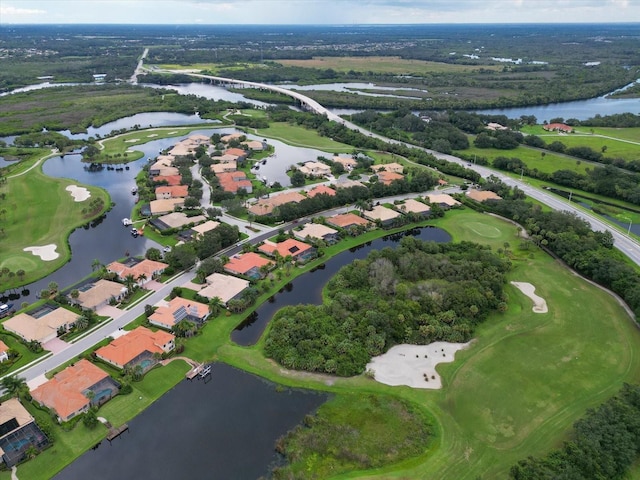 birds eye view of property featuring a residential view, a water view, and golf course view