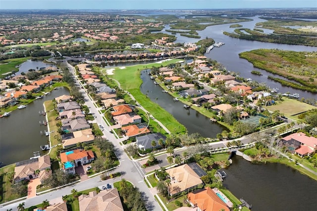 10509 Winding Stream Way, Bradenton, FL 34212 - aerial view of property's location featuring a large body of water, nearby suburban area, and a golf course