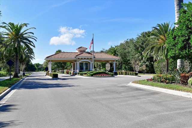 10509 Winding Stream Way, Bradenton, FL 34212 - view of asphalt road featuring curbs and traffic signs