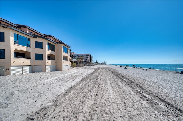 exterior space with a view of the beach and a water view