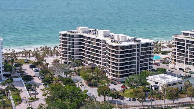 aerial view with a beach view and a water view