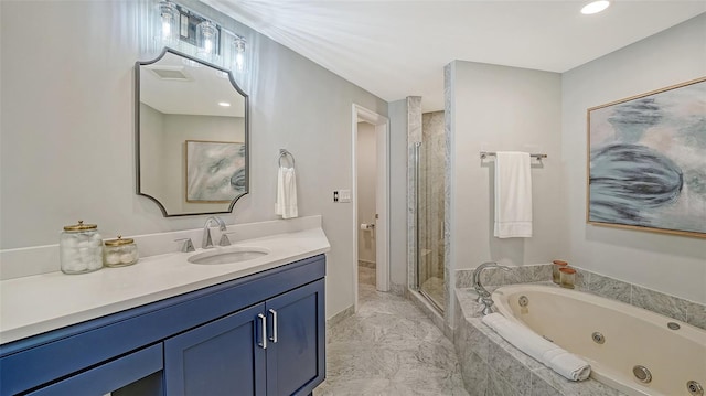 full bathroom with a whirlpool tub, a shower stall, vanity, and recessed lighting