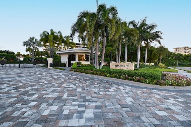 view of property's community featuring fence