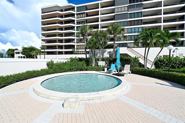 view of pool featuring a patio area