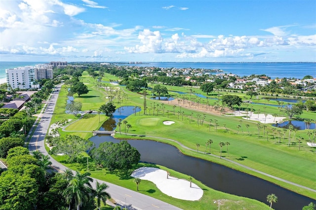 aerial view featuring a water view and golf course view