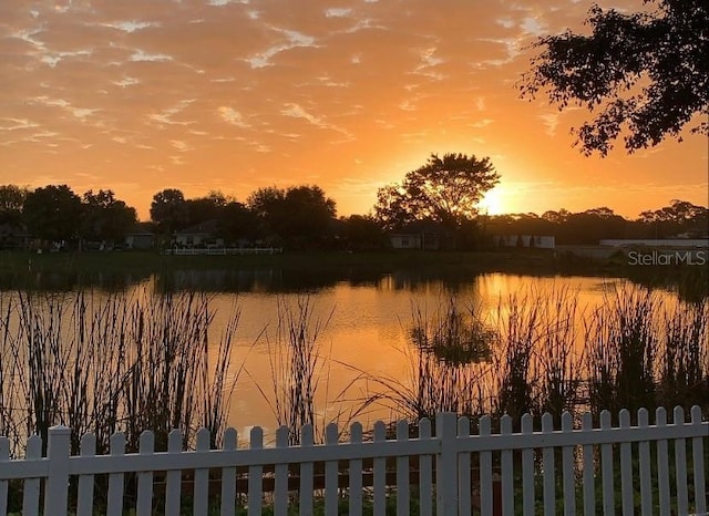 water view featuring fence