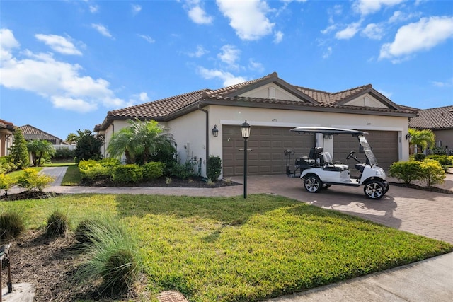 view of home's exterior featuring a yard and a garage